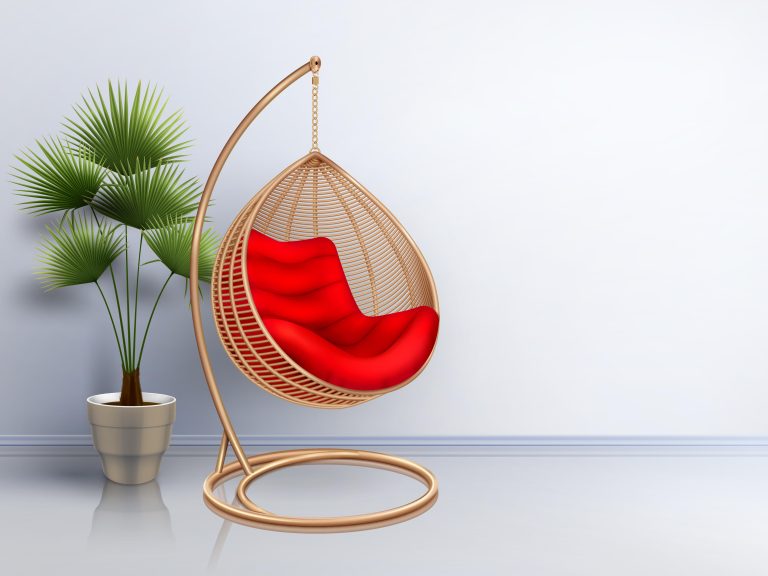 Wicker hangstoel met plant in modern interieur, trend van het seizoen hangstoel voor buitenruimte
